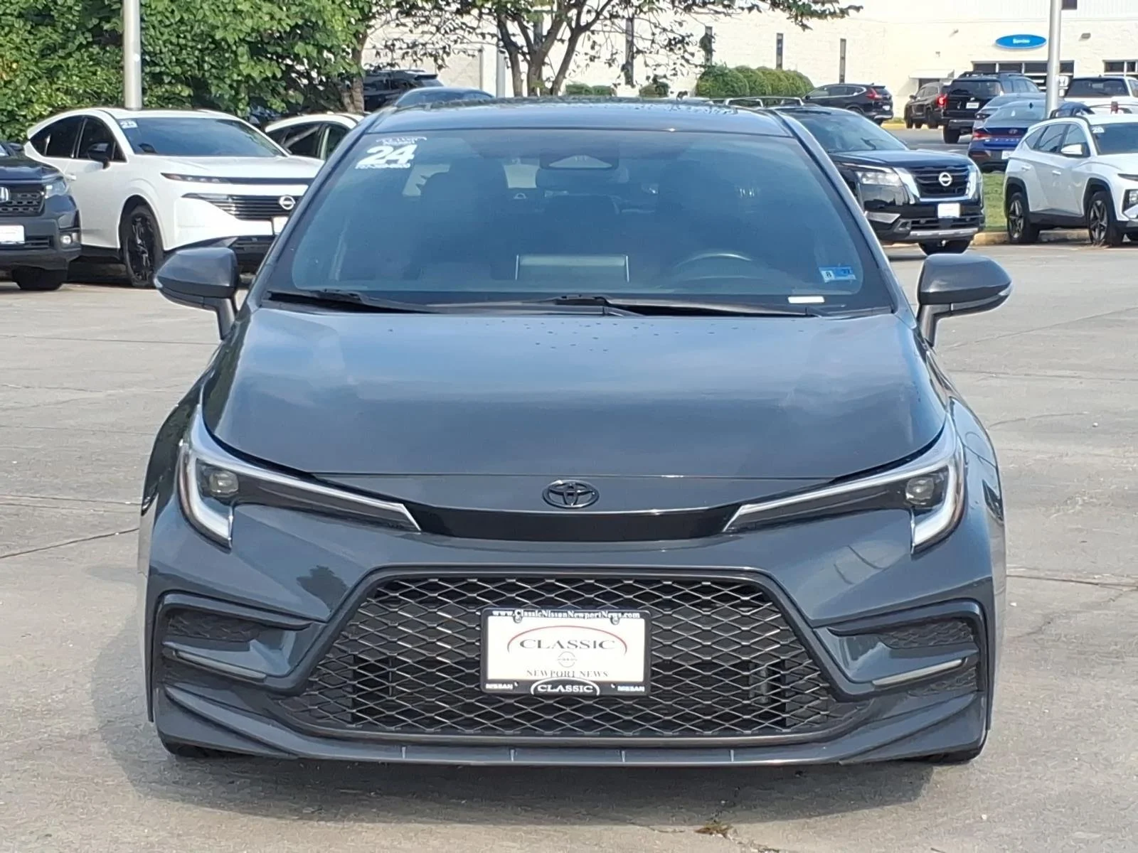 Used 2024 Underground/Midnight Black Metallic Toyota XSE image 2