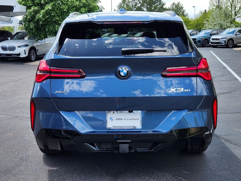 New 2026 Arctic Race Blue metallic BMW 30 xDrive image 4