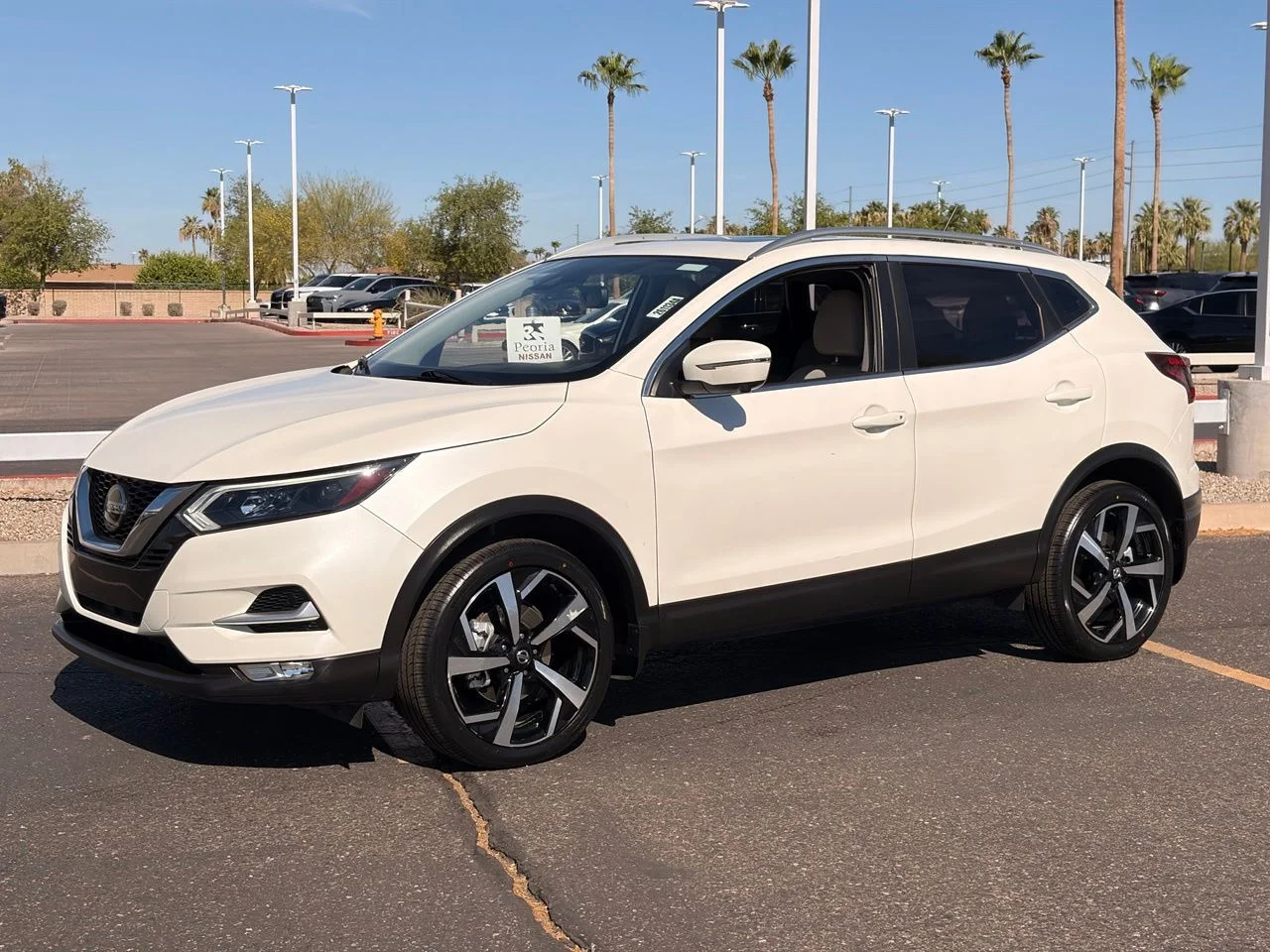 Used 2022 Pearl White Tricoat Nissan SL image 1