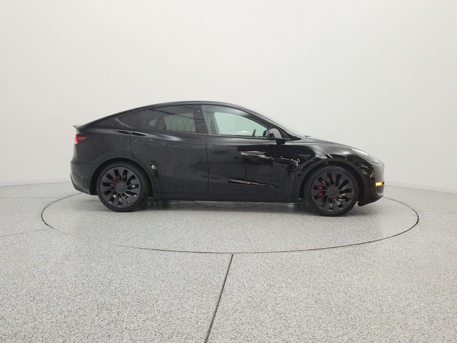 Used 2022 Solid Black Tesla Performance AWD image 4