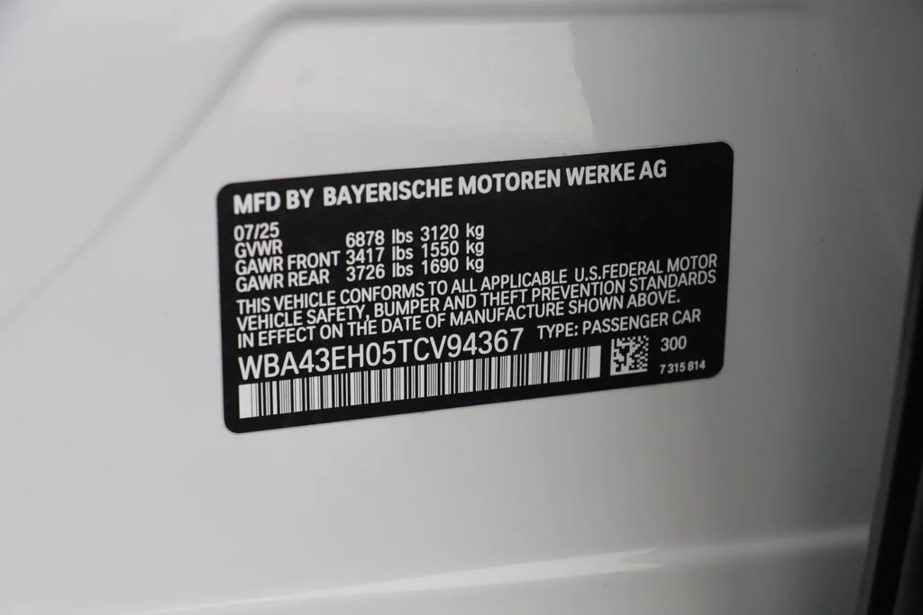 Certified Used 2026 White BMW 750e xDrive image 27