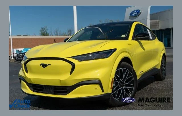 Used 2025 Yellow Ford Premium image 1