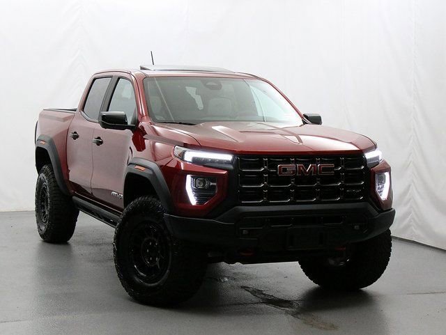 Volcanic Red Tintcoat 2025 GMC Canyon AT4 Crew Cab 4WD Pickup Truck Four-Wheel Drive 8-Speed Automatic