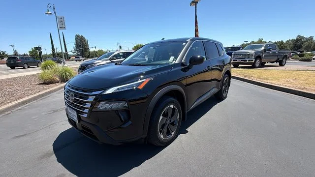 Used 2025 Black Nissan SV image 1