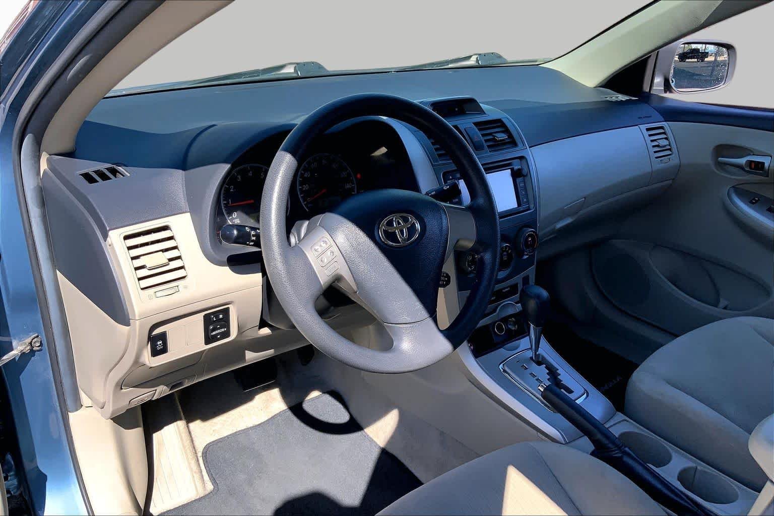 Used 2013 Tropical Sea Metallic Toyota LE image 18
