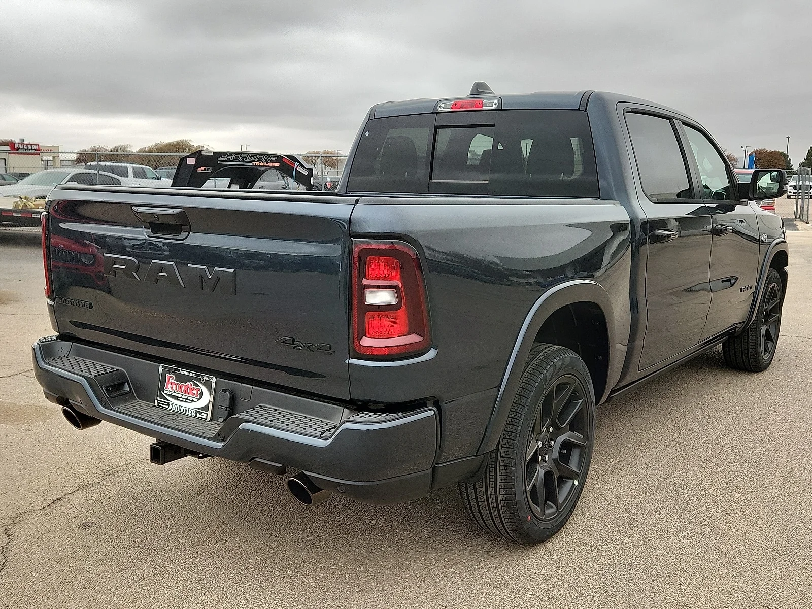 New 2026 Forged Blue Metallic  Paint Ram LARAMIE CREW CAB 4X4 5