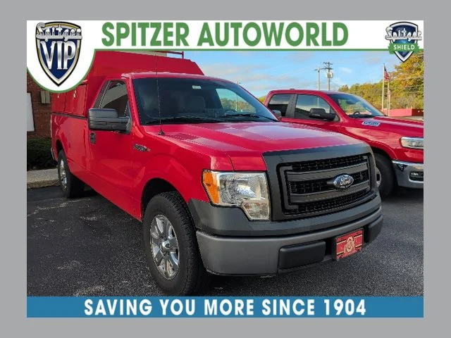 Used 2013 Vermillion Red Ford XL image 1