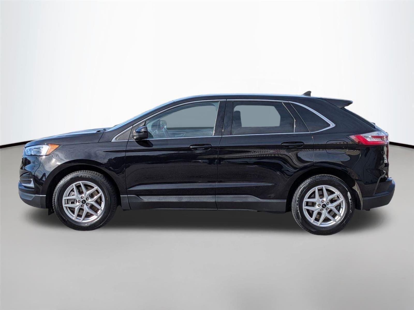 Used 2024 Agate Black Metallic Ford SEL image 8