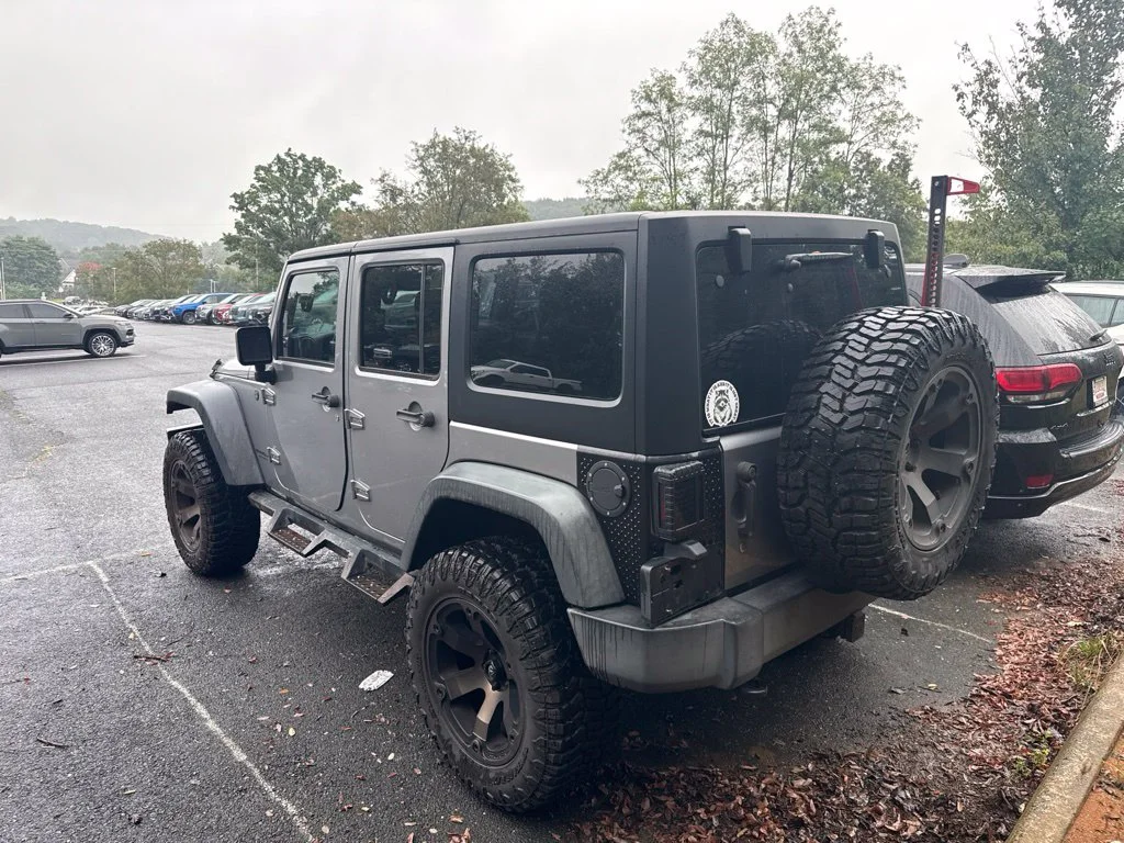Used 2017 Silver Jeep Unlimited Sport image 3