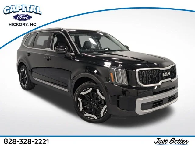 Used 2024 Black Kia EX image 1