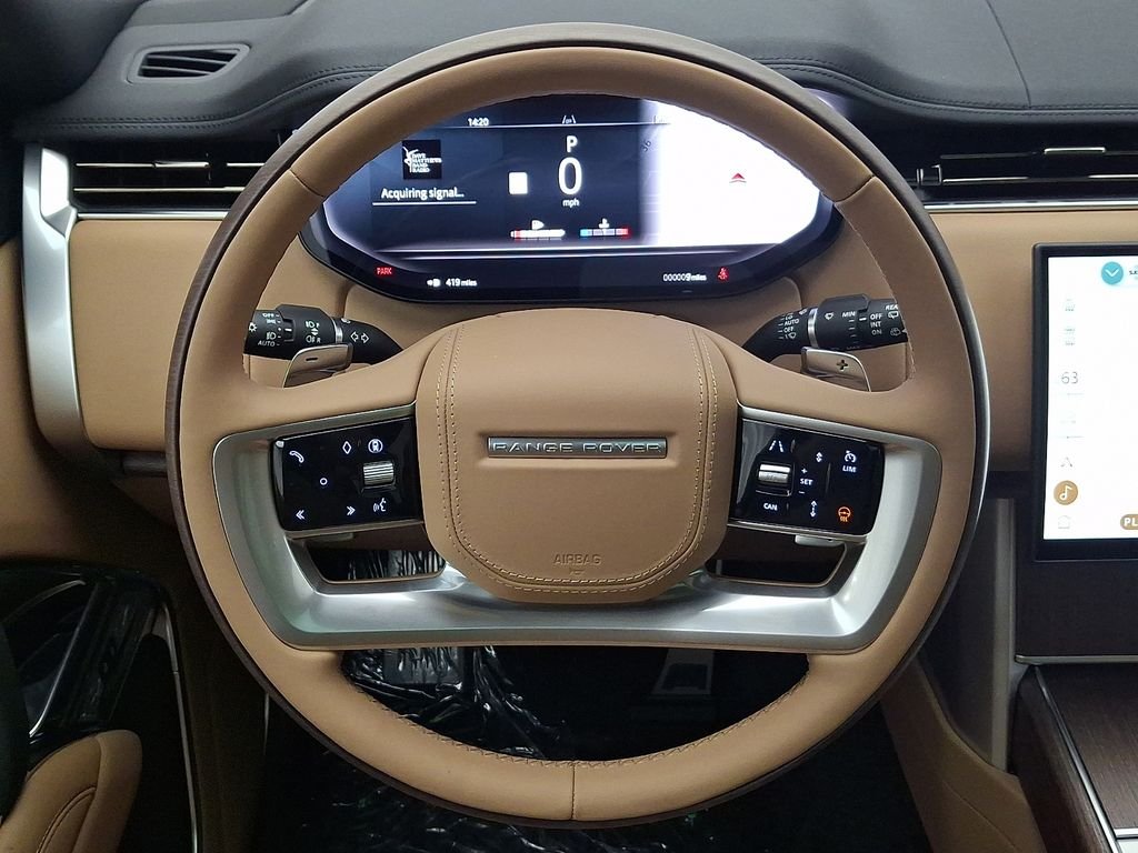 New 2026 Santorini Black Metallic Land Rover SE image 18