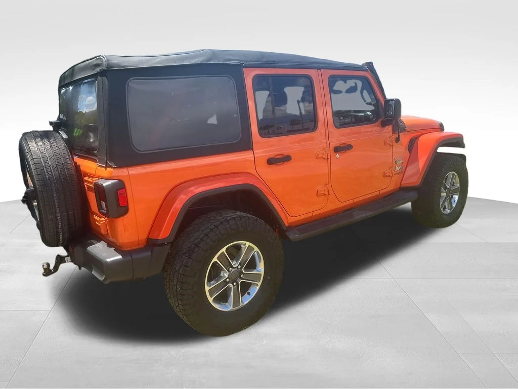 Used 2018 Orange Jeep Unlimited Sahara image 23