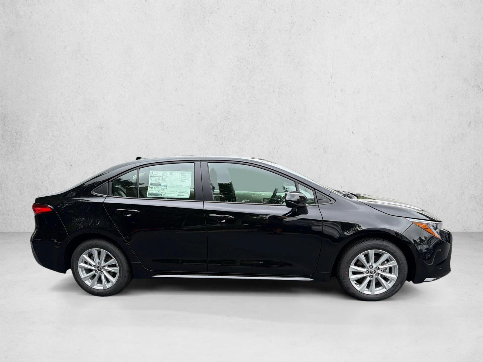 New 2026 Midnight Black Metallic Toyota LE image 2