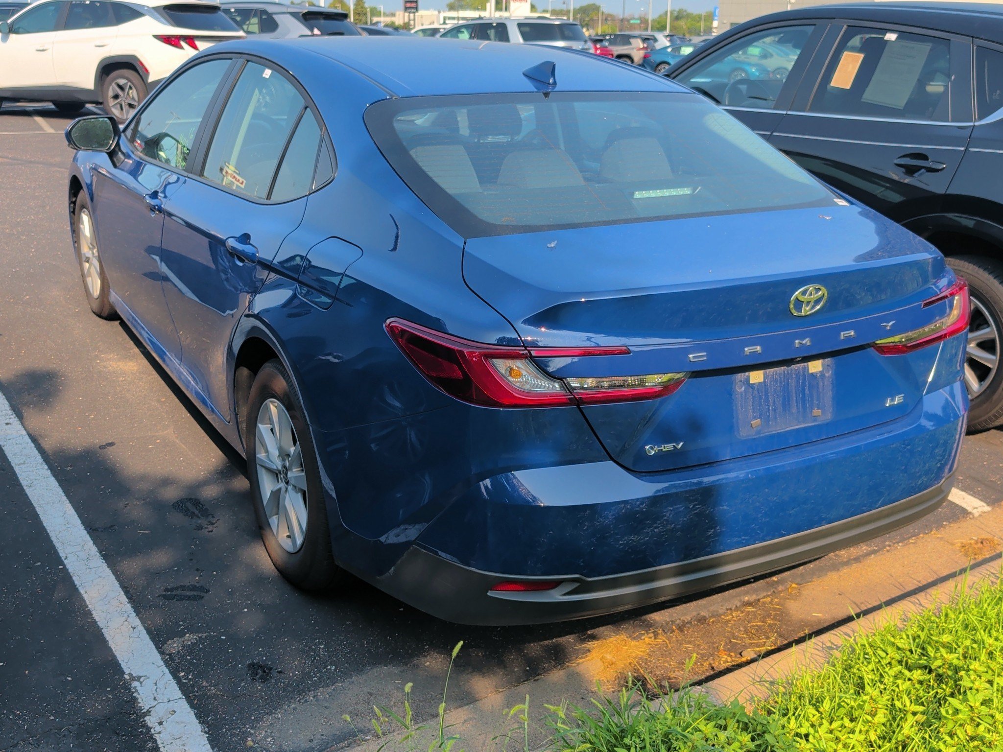 Used 2026 Reservoir Blue Toyota LE image 3