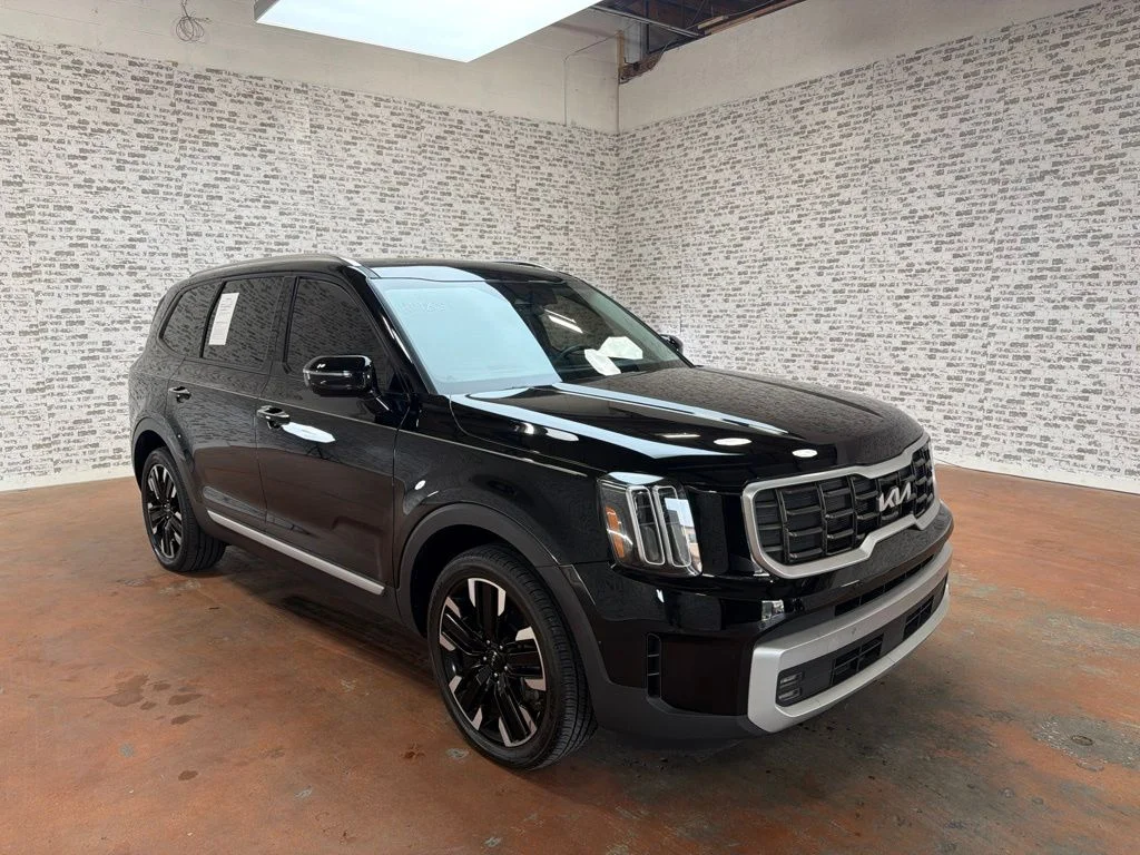 Used 2024 Ebony Black Kia SX image 1