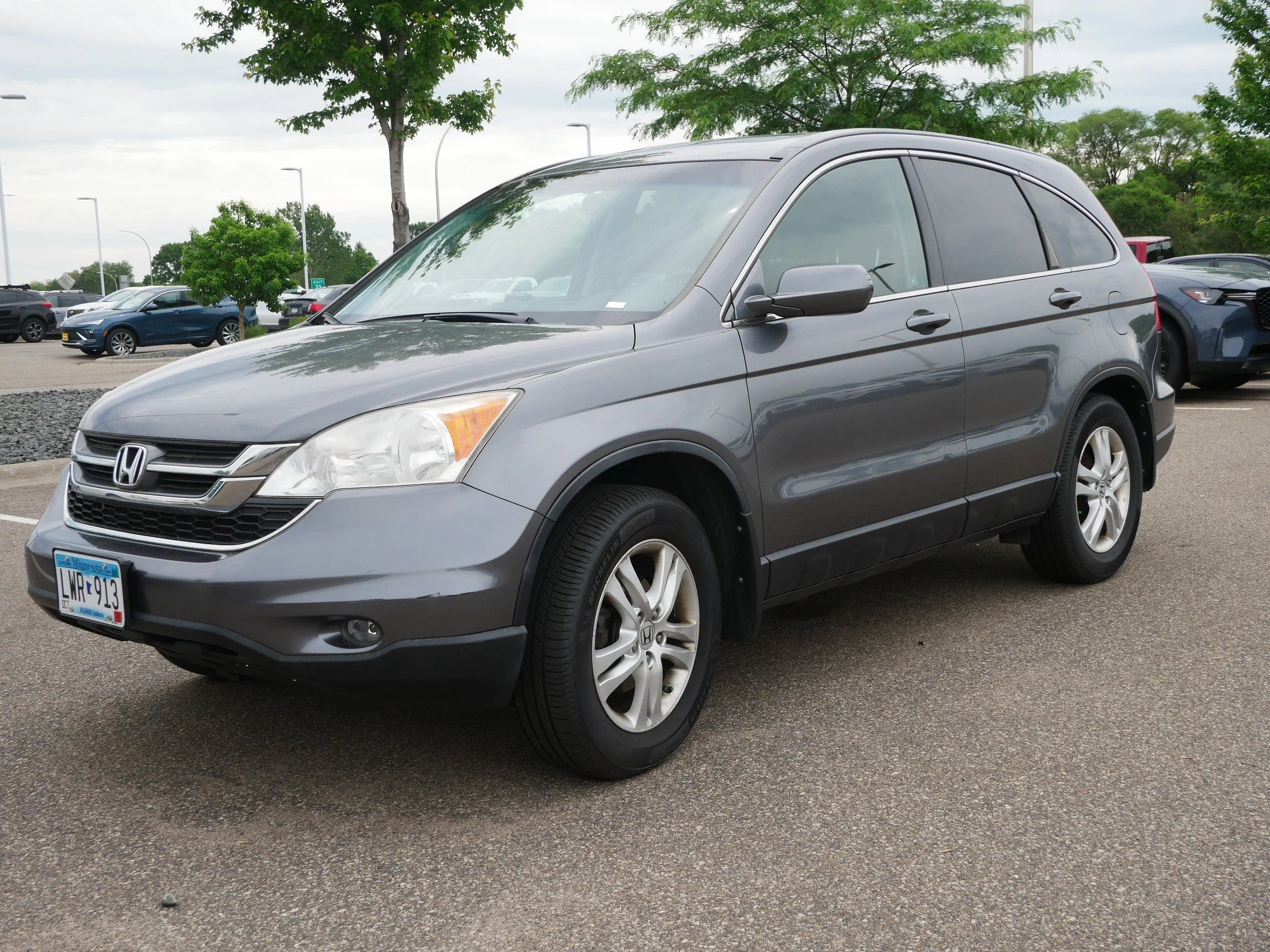 Used 2011 Honda CR-V EX-L with VIN JHLRE4H77BC007792 for sale in Brooklyn Center, Minnesota