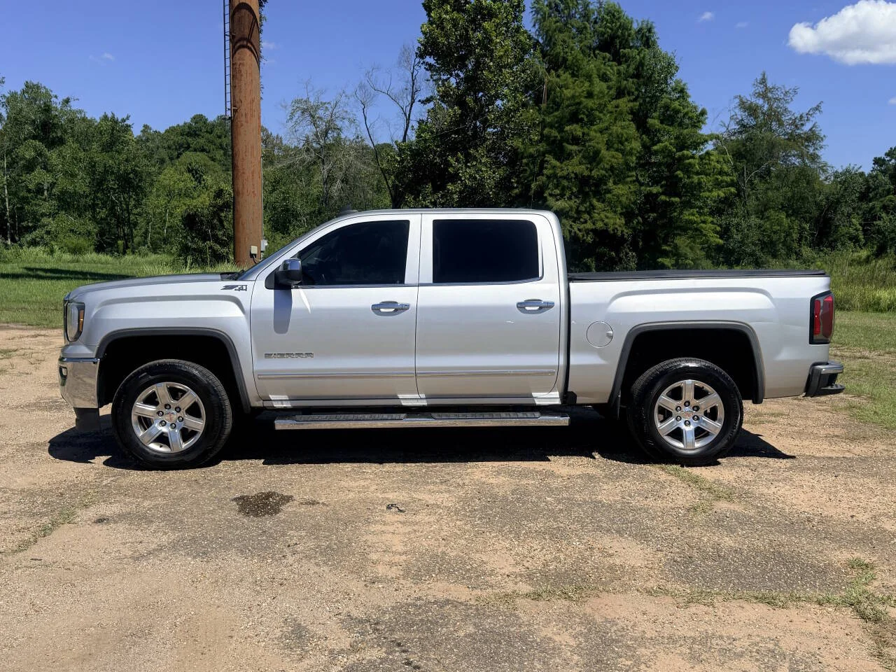 Used 2017 Silver GMC SLT 4x4 4dr Crew Cab 5.8 ft. SB image 2