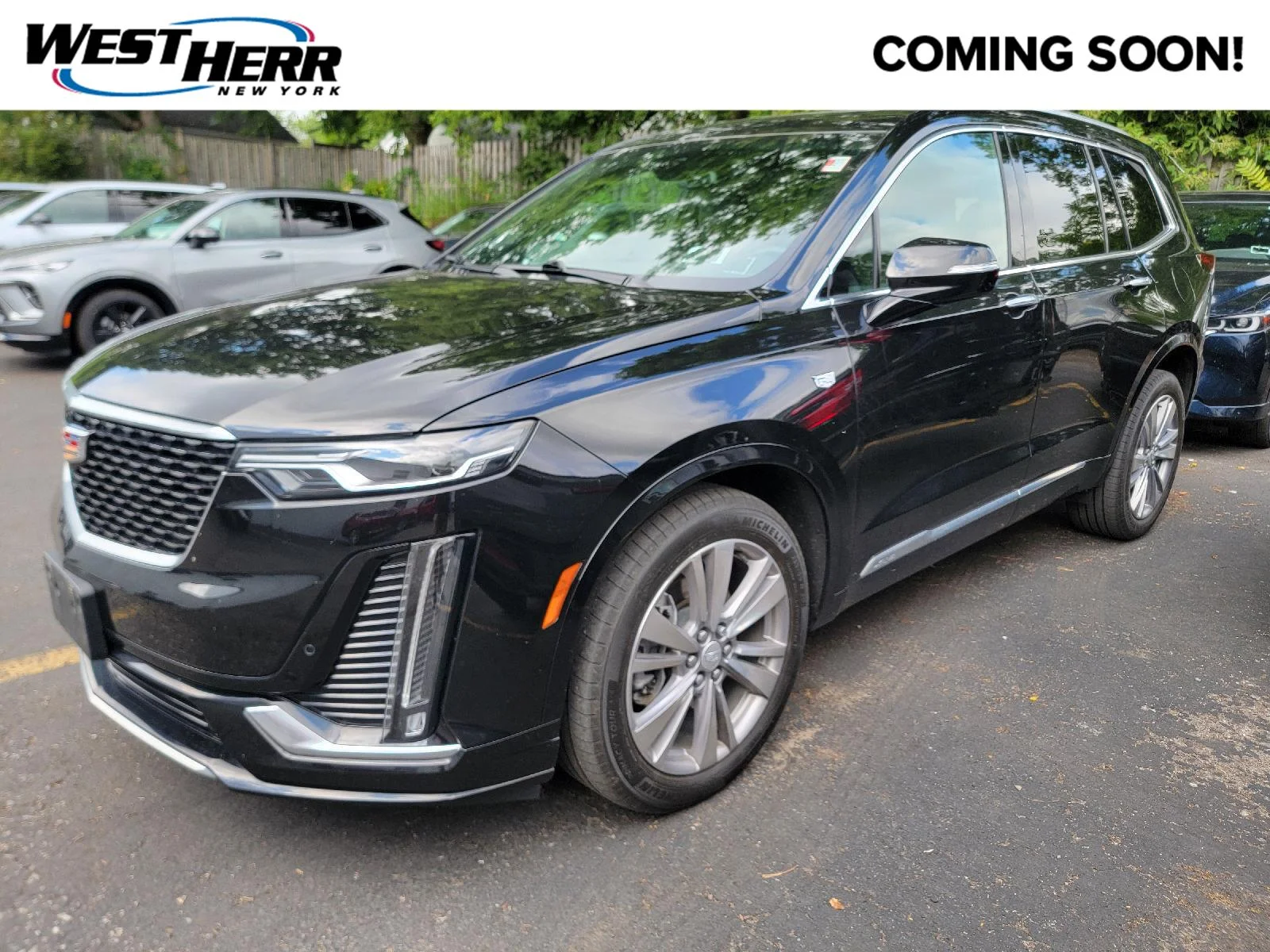 Used 2024 Stellar Black Metallic Cadillac AWD Premium Luxury image 1
