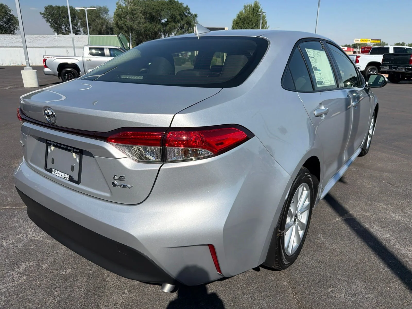 New 2026 Classic Silver Metallic Toyota Hybrid LE image 7