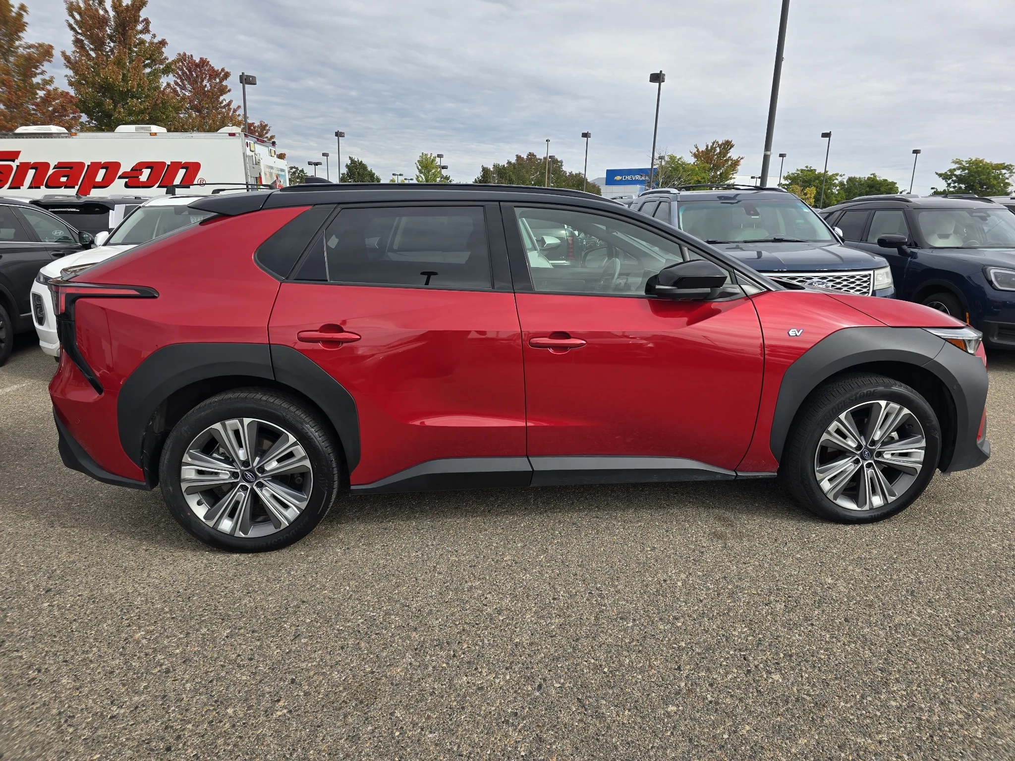 Used 2023 Elemental Red Pearl 2-Tone Subaru Touring image 7