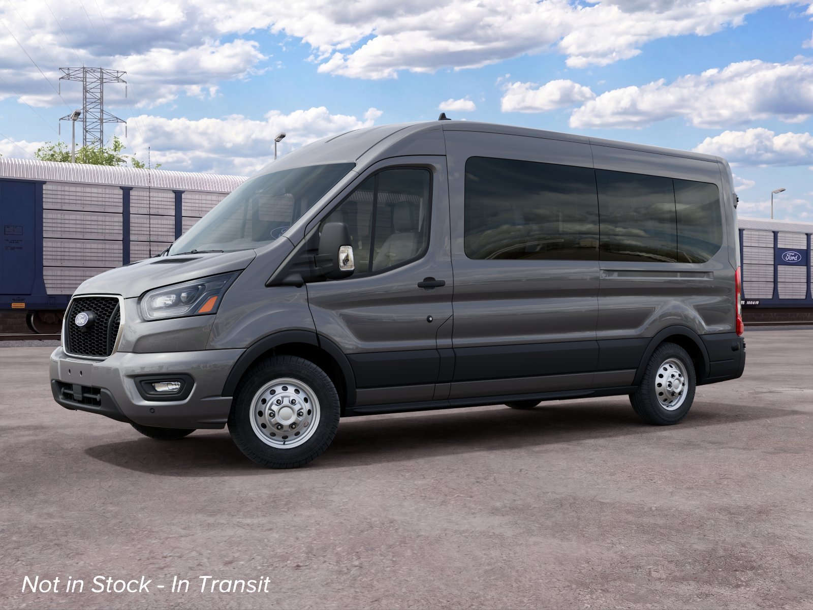 New 2027 Carbonized Gray Metallic Ford Passenger Van XLT image 1