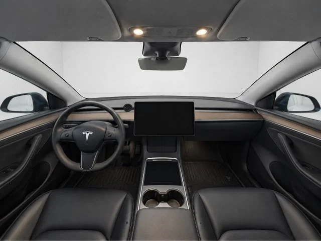 Used 2023 Solid Black Tesla Performance image 12