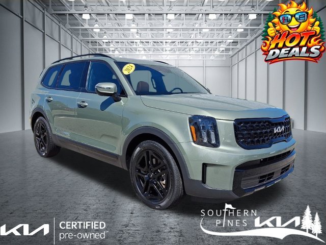 Used 2024 Green Kia EX X-Line image 1