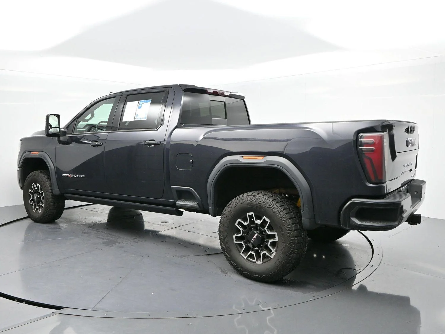Used 2024 Titanium Rush Metallic GMC AT4X image 5