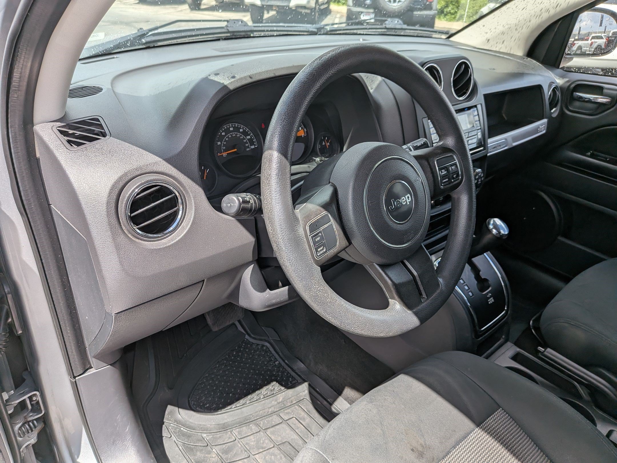 Used 2014 Billet Silver Clearcoat Metallic Jeep Sport image 14