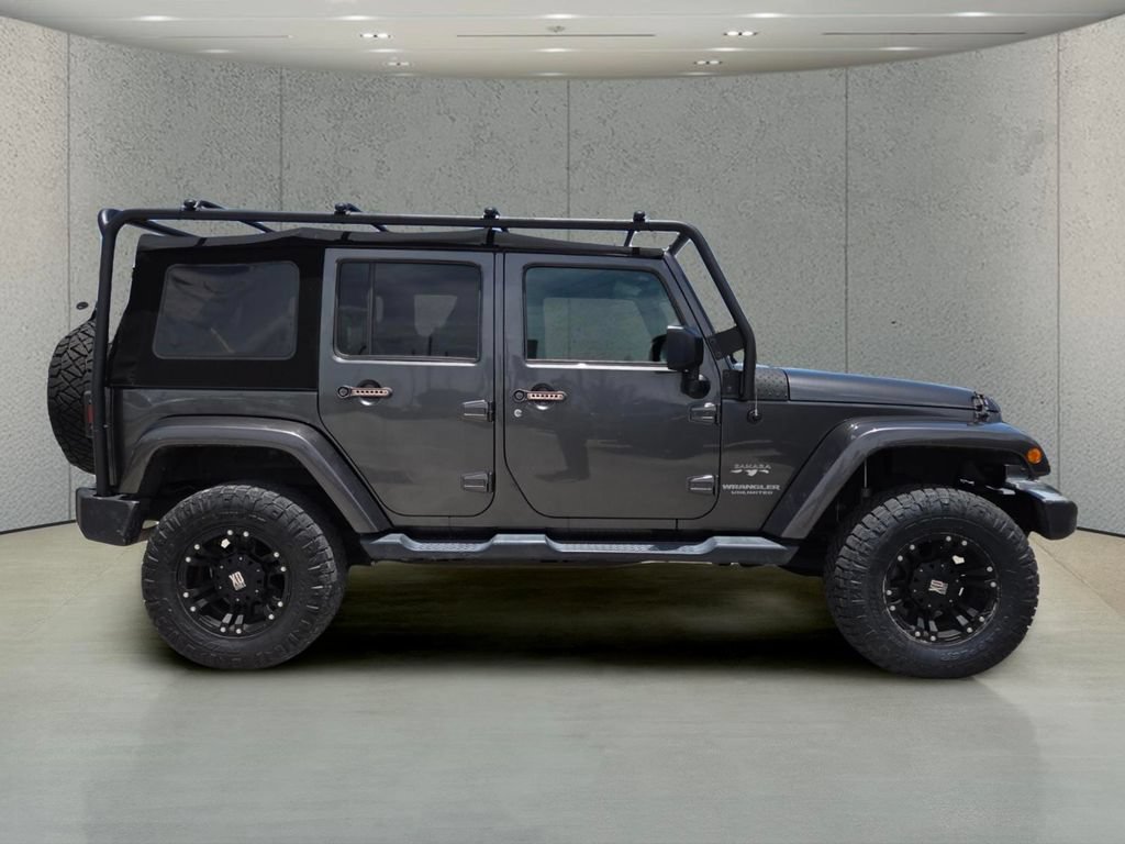 Used 2017 Granite Crystal Metallic Clearcoat Jeep Sahara image 2