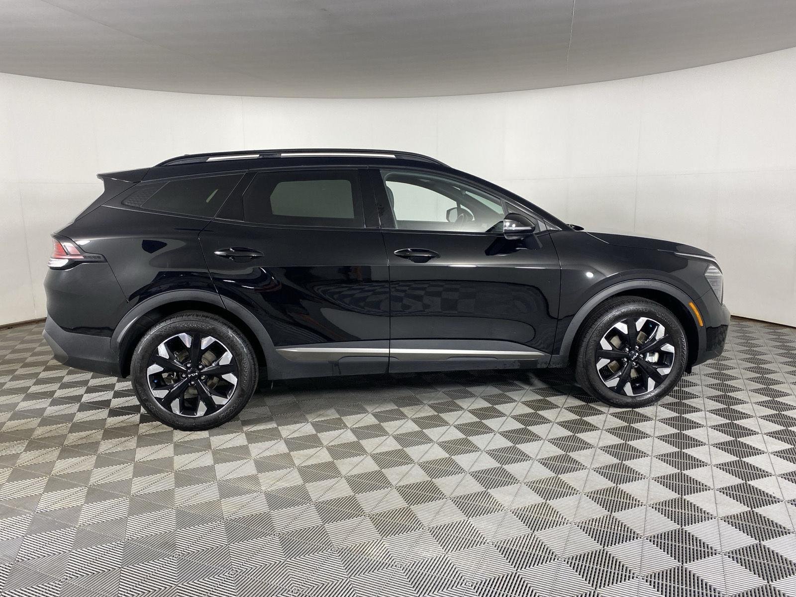 Used 2024 Ebony Black Kia X-Line image 11