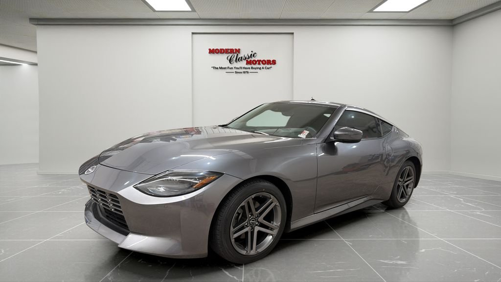 Used 2024 Gray Nissan Sport image 1