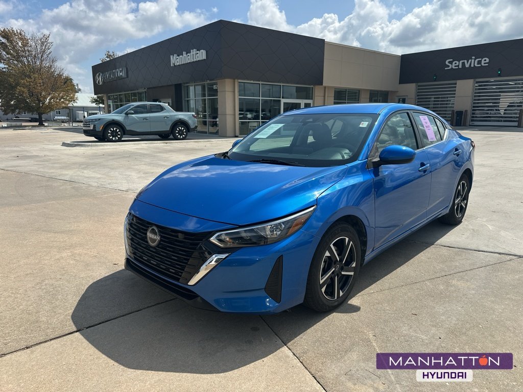 Used 2024 Electric Blue Metallic Nissan SV image 1