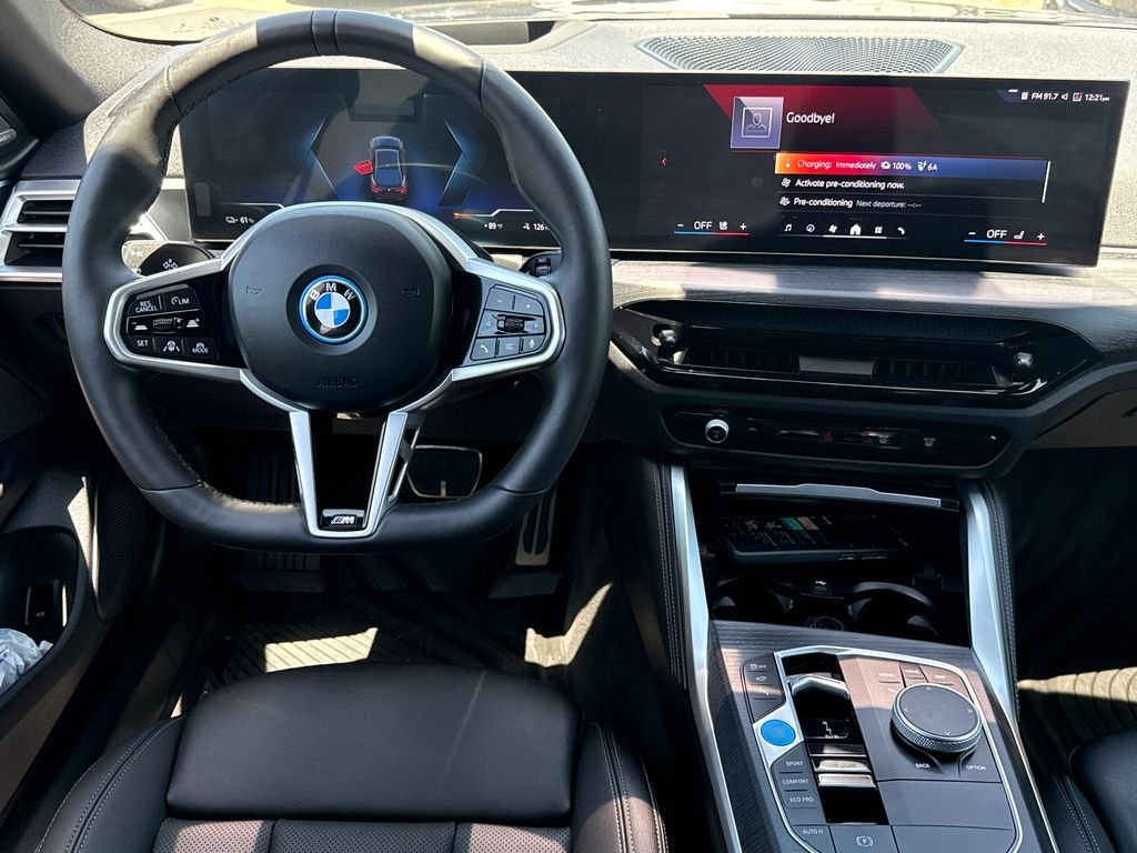 Used 2025 Black Sapphire Metallic BMW eDrive40 image 20