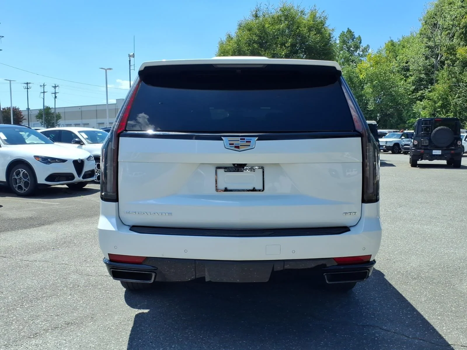 Used 2023 Crystal White Tricoat Cadillac 4WD Sport image 11