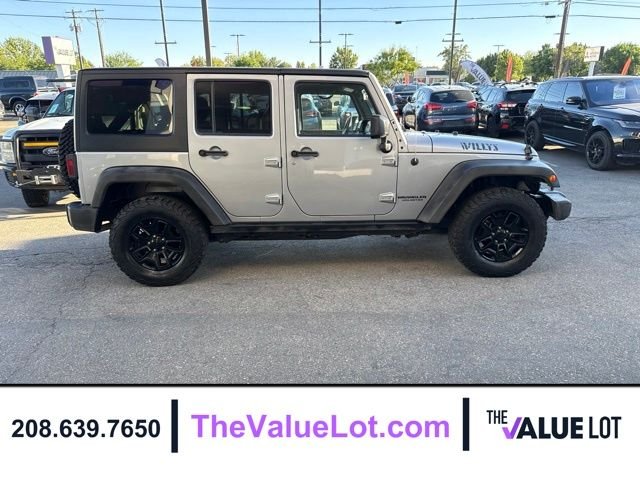 Used 2015 Silver Jeep Unlimited Sport image 3