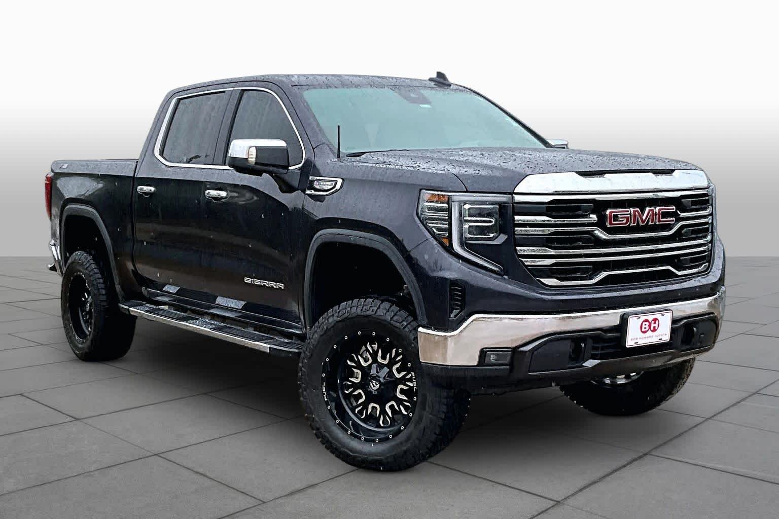 Used 2023 Titanium Rush Metallic GMC SLT image 3