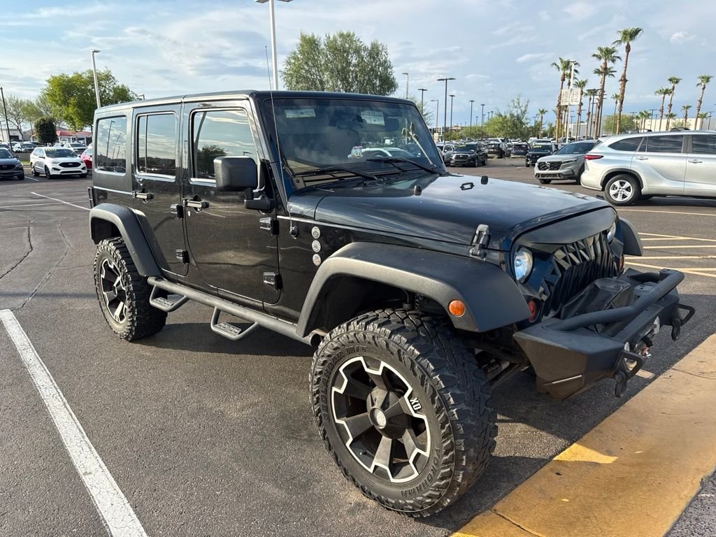 Used 2011 Black ClearCoat Jeep Unlimited Rubicon image 7