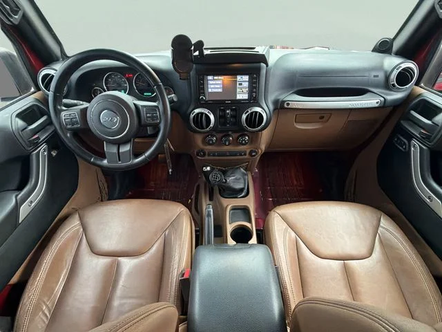 Used 2013 Red Jeep Unlimited Sahara image 26