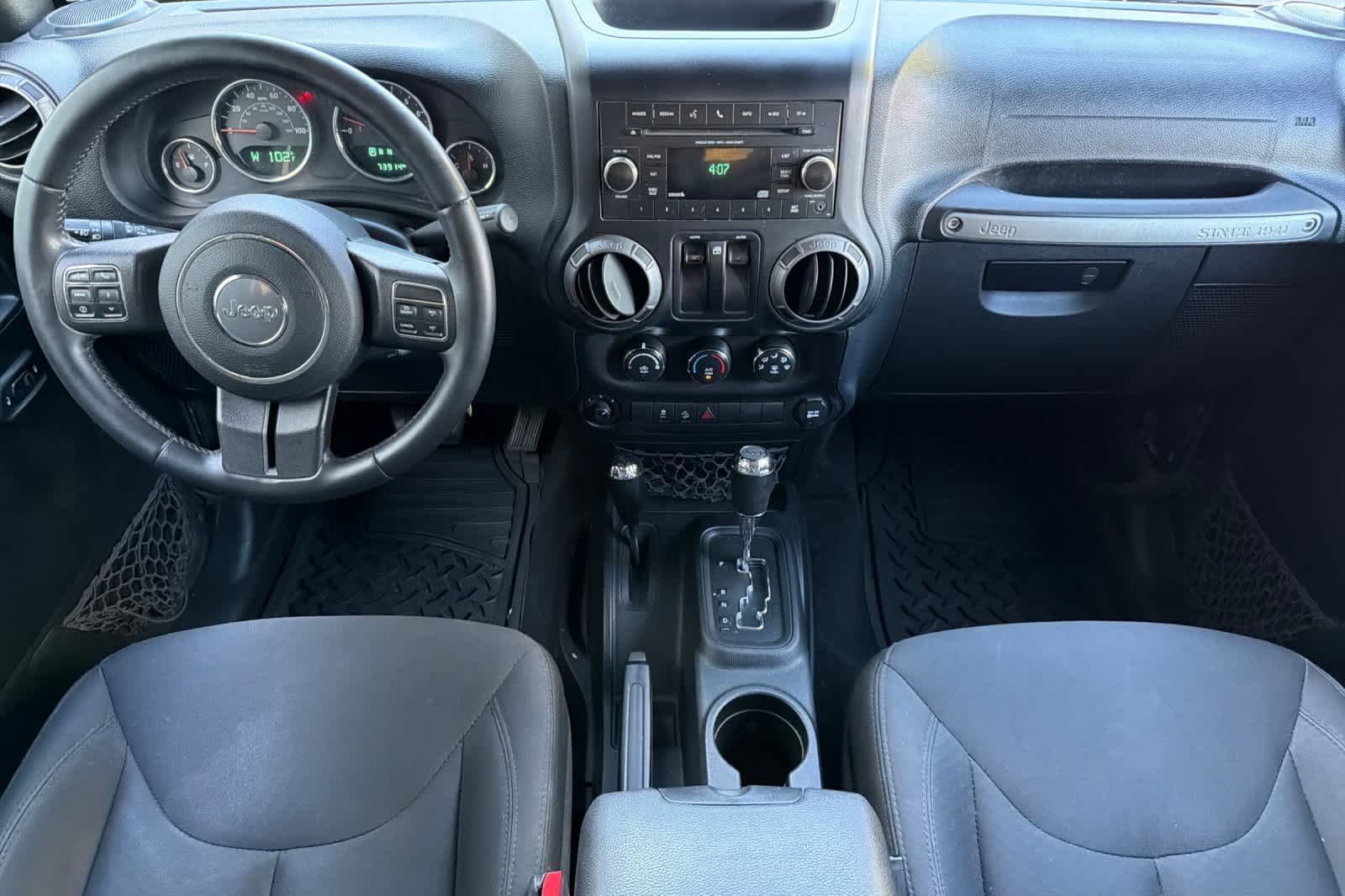 Used 2018 Granite Crystal Metallic Clearcoat Jeep Sport S image 3