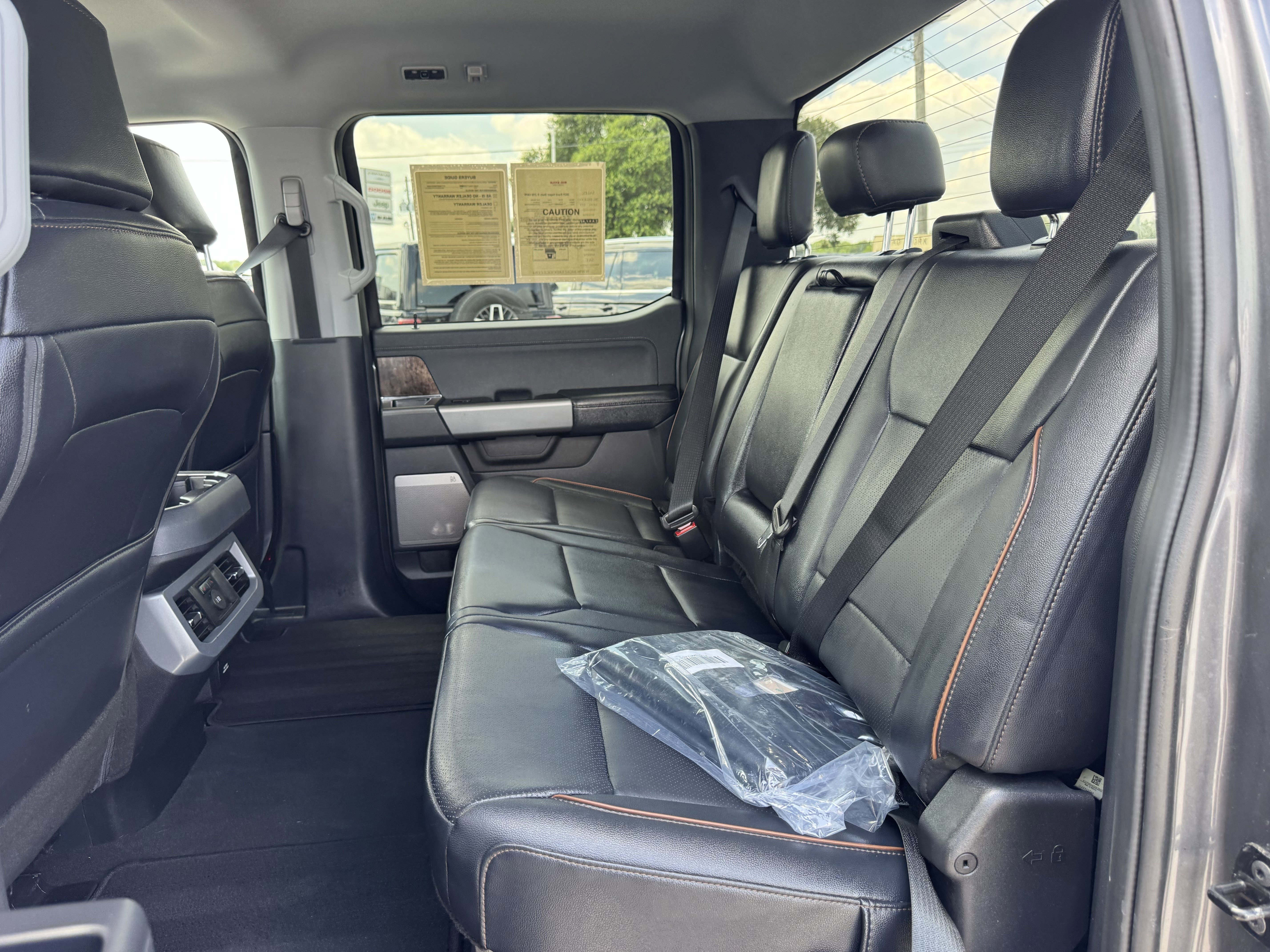 Used 2025 Gray Metallic Ford LARIAT 4WD Crew Cab 6.75