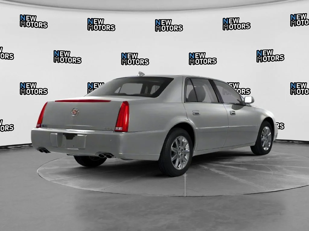 Used 2010 Radiant Silver Cadillac Base image 2