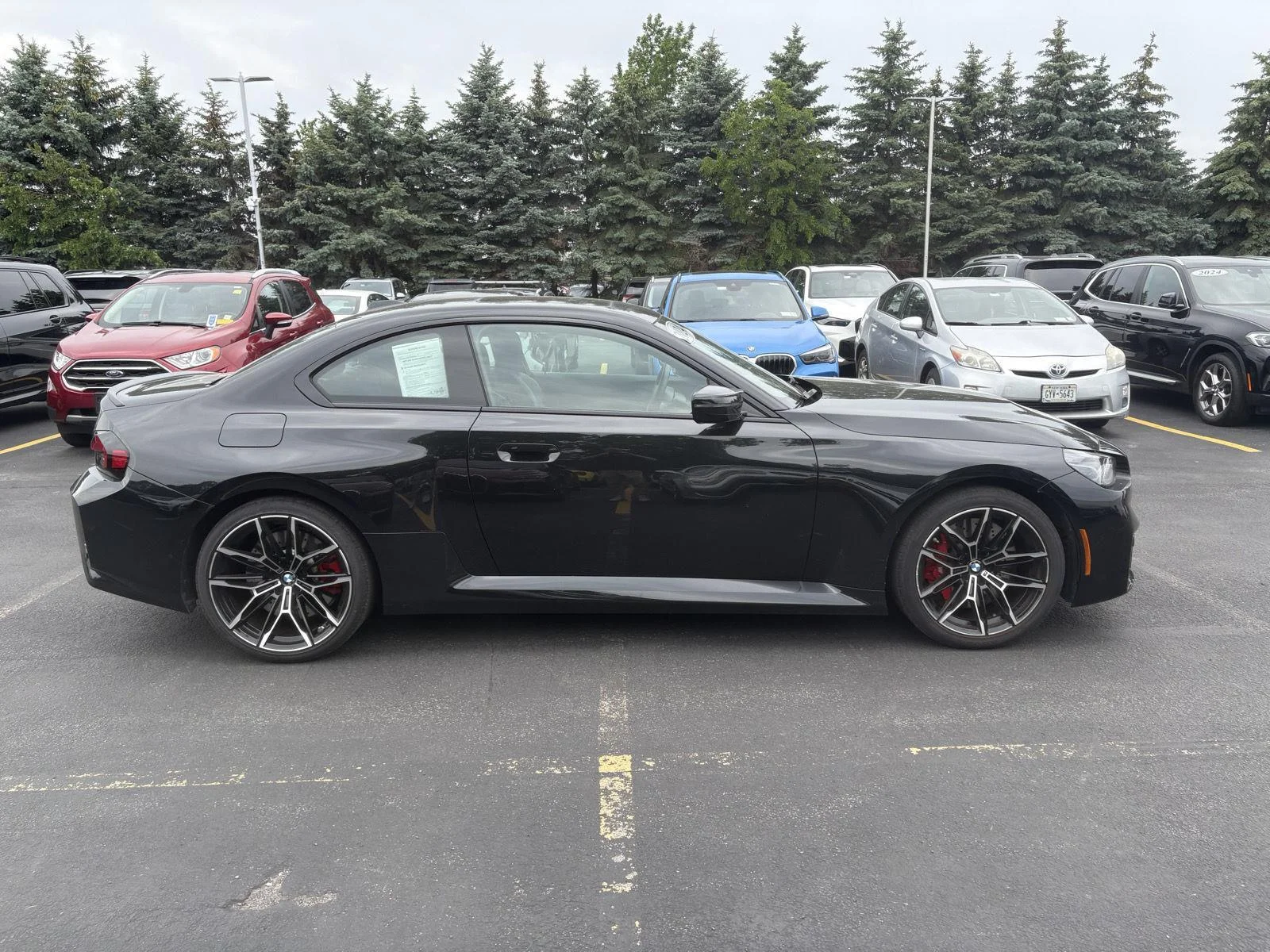 Used 2024 Black Sapphire Metallic BMW M2 Base image 6