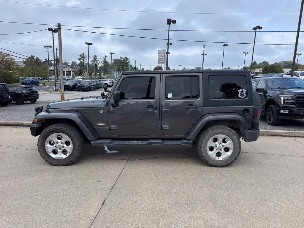 Used 2014 Gray Jeep Unlimited Sahara image 9