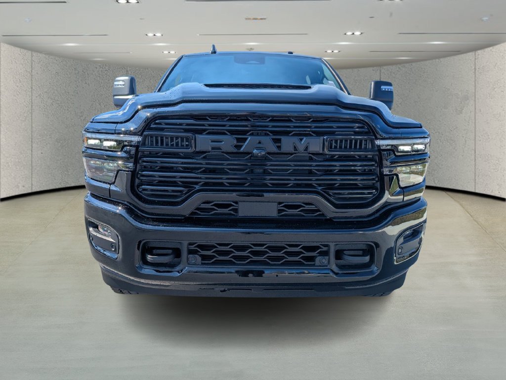 New 2026 Diamond Black Crystal Pearl-Coat Exterior Paint RAM Laramie image 2