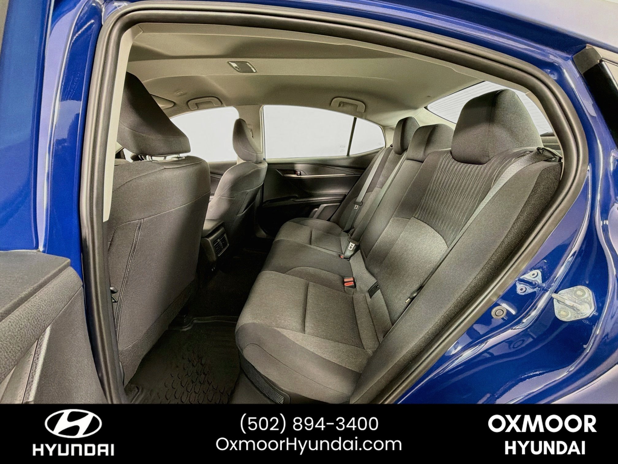 Used 2025 Reservoir Blue Toyota LE image 23