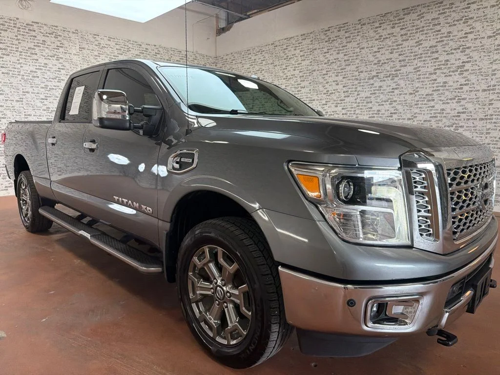 Used 2019 Gun Metallic Nissan SL image 1
