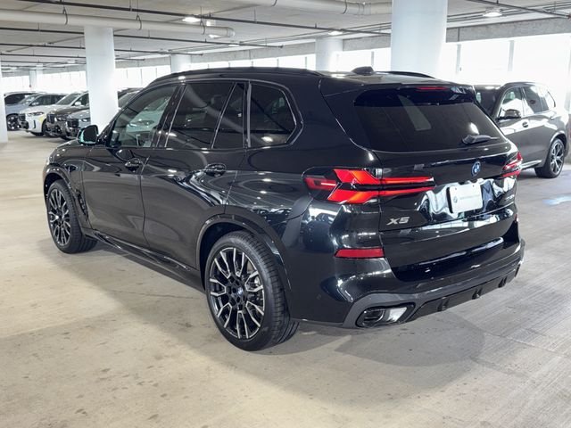 New 2026 Black Sapphire Metallic BMW xDrive50e image 5