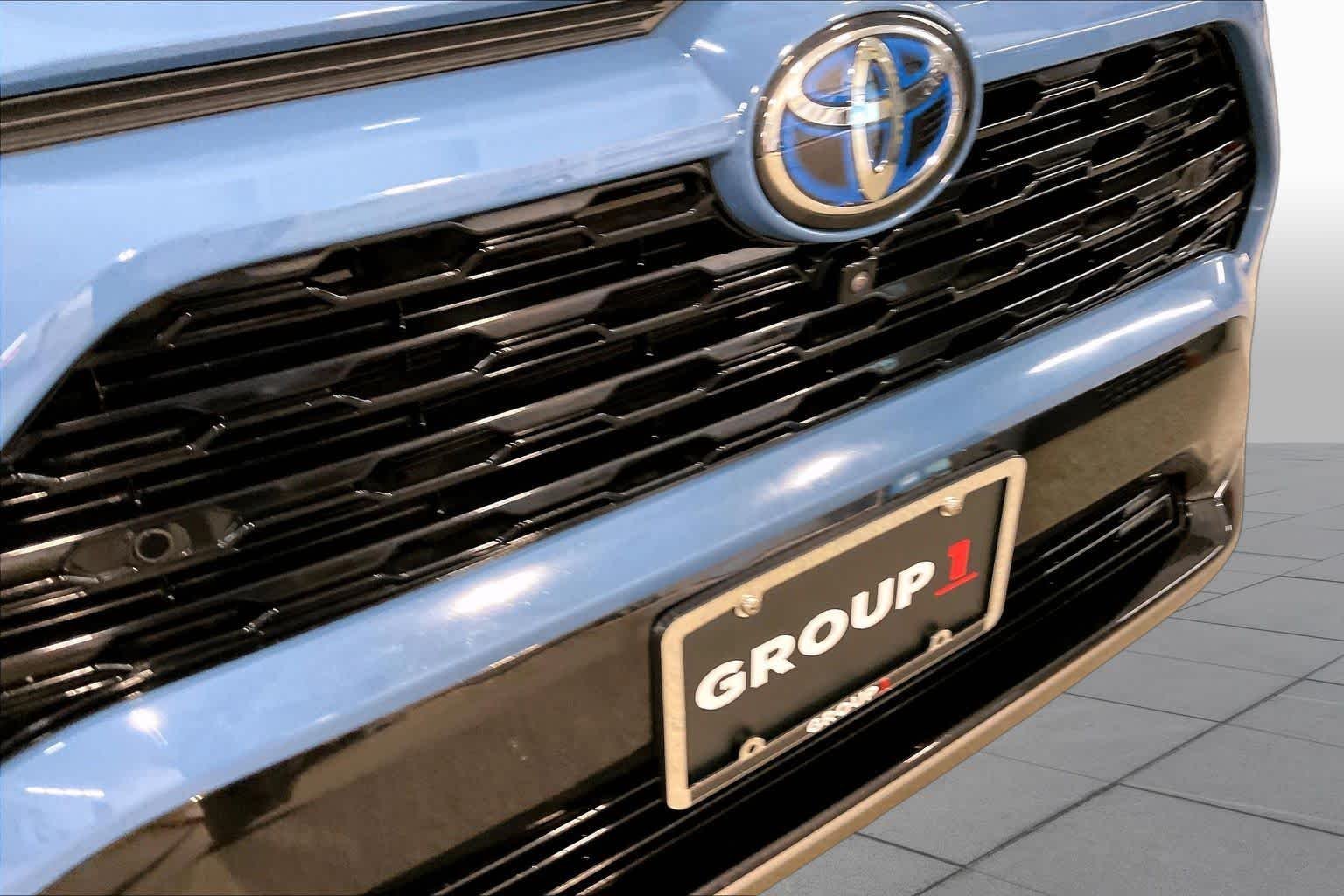 Used 2023 Cavalry Blue/Midnight Black Metallic Toyota Hybrid XSE image 30