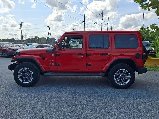 Used 2019 Red Jeep Unlimited Sahara image 4